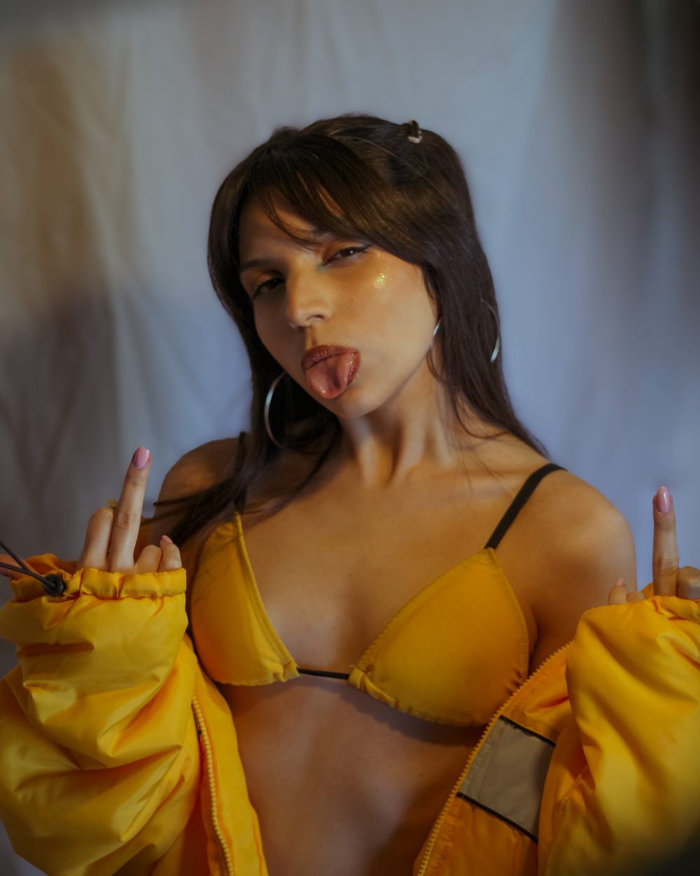 Studio portrait in yellow